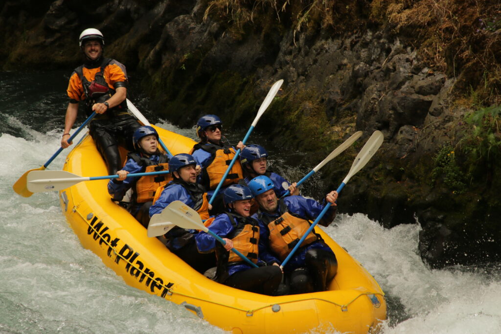 a whitewater raft filled with people